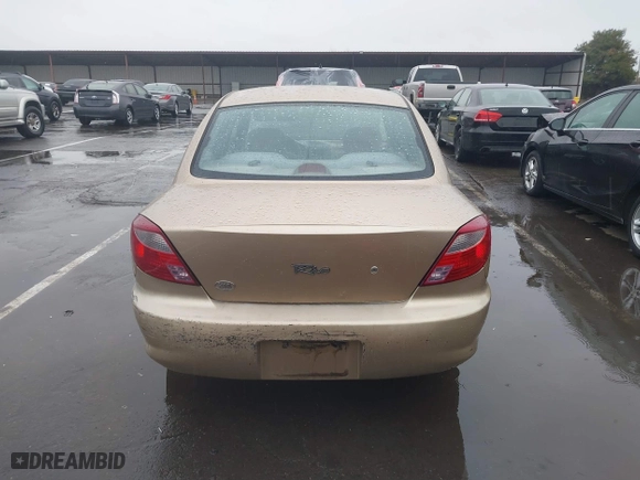 2002 Kia Rio with VIN KNADC123626192611, listed as a IAAI auction lot 41765104 with 62,387 mi miles. Bid and sale history available at carsss.com. Image 16.