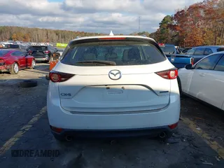 2020 Mazda CX-5 Sport with VIN JM3KFABMXL1824574, listed as a IAAI auction lot 41029057 with 47,760 mi miles. Bid and sale history available at carsss.com. Image 16.