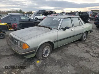 1981 Mazda 626 z VIN JM1GB2216B0531636, wystawiony jako Copart lot #85505404 z przebiegiem 41 816 mil mil oraz Szkoda całkowita • Salvage title. Historia ofert i sprzedaży dostępna na DreamBid. Obrazek 1.