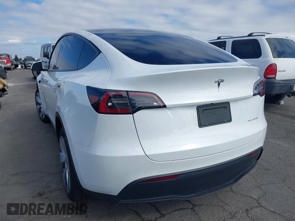 2023 Tesla Model Y Long Range with VIN 7SAYGDEE9PA094191, listed as a IAAI auction lot 41906319 with 15,240 mi miles and . Bid and sale history available at DreamBid. Image 3.