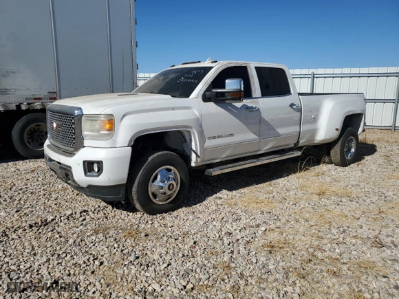 2015 GMC Sierra 3500HD Denali with VIN 1GT424E8XFF668587, listed as a Copart auction lot 87415324 with 125,606 mi miles and Salvage Title. Bid and sale history available at carsss.com. Image 1.