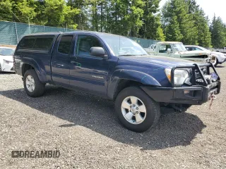 2013 Toyota Tacoma with VIN 5TFUU4EN5DX061097, listed as a Copart auction lot 60756615 with 148,581 mi miles and Salvage title. Bid and sale history available at DreamBid. Image 4.