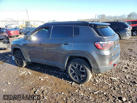 2019 Jeep Compass Trailhawk with VIN 3C4NJDDB5KT775860, listed as a Copart auction lot 48113695 with 76,091 mi miles and Salvage Title. Bid and sale history available at DreamBid. Image 2.