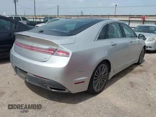 2014 Lincoln MKZ with VIN 3LN6L2GK4ER814286, listed as a IAAI auction lot 42657654 with 135,708 mi miles and . Bid and sale history available at DreamBid. Image 4.