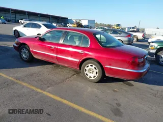 1999 Lincoln Continental with VIN 1LNHM97V8XY633821, listed as a IAAI auction lot 41769620 with 268,617 mi miles and . Bid and sale history available at DreamBid. Image 3.