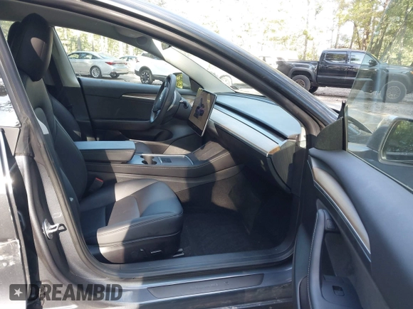 2022 Tesla Model 3 Performance with VIN 5YJ3E1EC7NF329679, listed as a IAAI auction lot 40555901 with 32,552 mi miles and . Bid and sale history available at DreamBid. Image 5.