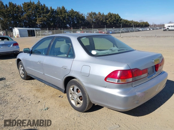 2002 Honda Accord EX z VIN 1HGCG56542A144609, wystawiony jako IAAI lot #41706668 z przebiegiem 220 536 mil mil oraz . Historia ofert i sprzedaży dostępna na DreamBid. Obrazek 3.