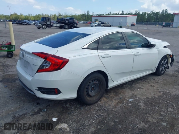 2020 Honda Civic LX z VIN 2HGFC2F65LH531818, wystawiony jako IAAI lot #41997104 z przebiegiem 68 878 mil mil oraz . Historia ofert i sprzedaży dostępna na DreamBid. Obrazek 4.