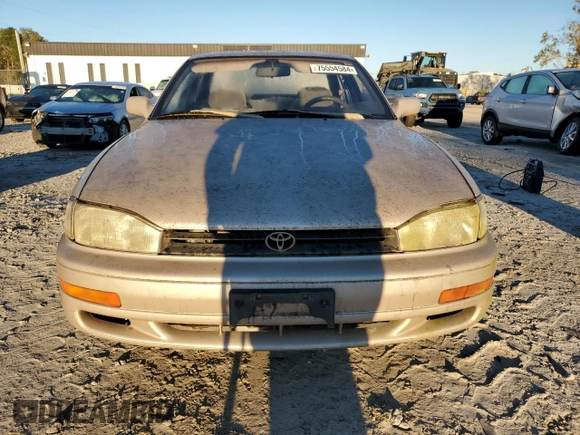 1992 Toyota Camry LE with VIN 4T1SK12E1NU127255, listed as a Copart auction lot 75554584 with 385,507 mi miles and Salvage Title. Bid and sale history available at carsss.com. Image 5.