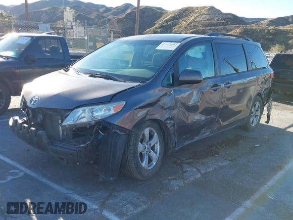 2015 Toyota Sienna LE AAS with VIN 5TDKK3DC3FS529845, listed as a IAAI auction lot 41627102 with 130,334 mi miles. Bid and sale history available at carsss.com. Image 2.