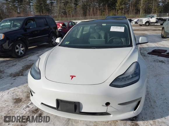2020 Tesla Model 3 Standard Range Plus with VIN 5YJ3E1EA7LF742973, listed as a IAAI auction lot 41409285 with 48,993 mi miles and . Bid and sale history available at DreamBid. Image 6.