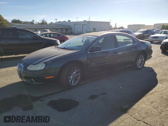 2001 Chrysler LHS z VIN 2C3AC56G31H606648, wystawiony jako Copart lot #77123814 z przebiegiem 83 574 mil mil oraz Tytuł czysty. Historia ofert i sprzedaży dostępna na DreamBid. Obrazek 1.