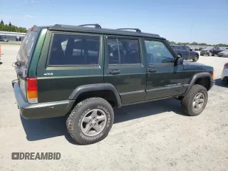 1998 Jeep Cherokee Sport with VIN 1J4FJ68S3WL150458, listed as a Copart auction lot 63278935 with 176,314 mi miles and Clean title. Bid and sale history available at DreamBid. Image 3.