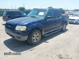 2003 Ford Explorer Sport Trac XLS z VIN 1FMZU77E53UB66531, wystawiony jako IAAI lot #42509028 z przebiegiem 199 323 mil mil oraz . Historia ofert i sprzedaży dostępna na DreamBid. Obrazek 2.
