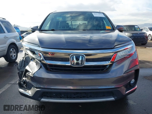2019 Honda Pilot Touring 7-Passenger z VIN 5FNYF5H65KB020420, wystawiony jako IAAI lot #41575972 z przebiegiem 48 950 mil mil oraz . Historia ofert i sprzedaży dostępna na DreamBid. Obrazek 12.