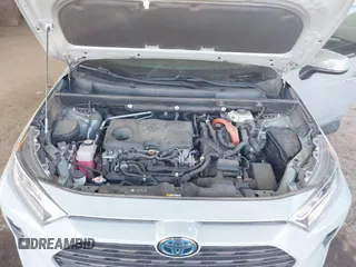 2020 Toyota RAV4 Hybrid XLE with VIN 2T3RWRFV0LW082793, listed as a IAAI auction lot 41674569 with 50,224 mi miles and . Bid and sale history available at DreamBid. Image 10.