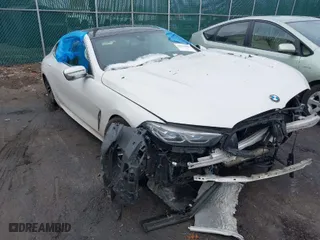 2022 BMW 8 Series M850i with VIN WBAGV8C07NCJ68473, listed as a IAAI auction lot 41153583 with 4,150 mi miles. Bid and sale history available at carsss.com. Image 1.