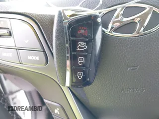 2018 Hyundai Santa Fe 2.4L z VIN 5XYZUDLB1JG543837, wystawiony jako IAAI lot #42235471 z przebiegiem 157 909 mil mil oraz . Historia ofert i sprzedaży dostępna na DreamBid. Obrazek 11.