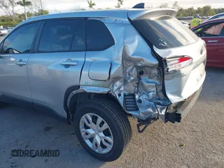 2022 Toyota Corolla Cross L with VIN 7MUAAAAG6NV010688, listed as a IAAI auction lot 41212520 with 50,075 mi miles and . Bid and sale history available at DreamBid. Image 6.