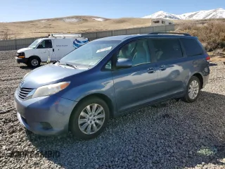 2014 Toyota Sienna LE with VIN 5TDJK3DC7ES081393, listed as a Copart auction lot 46713665 with 184,986 mi miles and Clean Title. Bid and sale history available at carsss.com. Image 1.