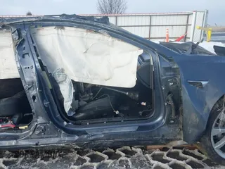 2020 Tesla Model 3 Long Range z VIN 5YJ3E1EB9LF787390, wystawiony jako IAAI lot #41614394 z przebiegiem Nie podano mil oraz . Historia ofert i sprzedaży dostępna na DreamBid. Obrazek 12.