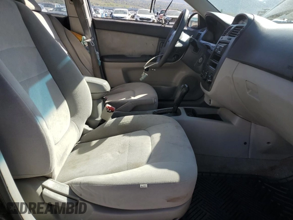 2005 Kia Spectra LX with VIN KNAFE122555102997, listed as a Copart auction lot 54191025 with 142,071 mi miles and Salvage Title. Bid and sale history available at carsss.com. Image 7.