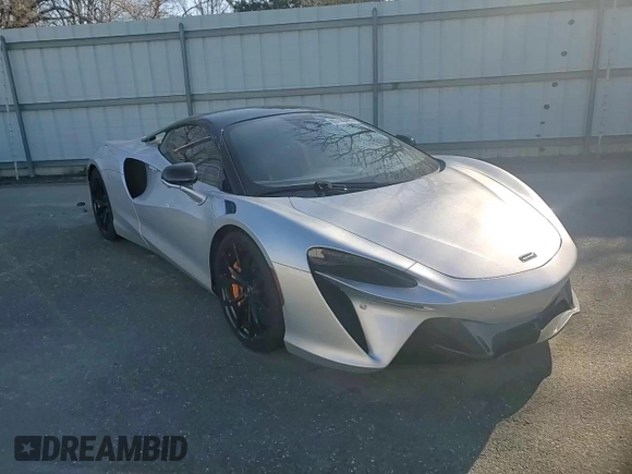 2023 McLaren Artura z VIN SBM16AEA4PW001953, wystawiony jako Copart lot #88790405 z przebiegiem 6864 mil mil oraz Nie do naprawy. Historia ofert i sprzedaży dostępna na DreamBid. Obrazek 11.