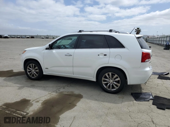 2012 Kia Sorento SX z VIN 5XYKWDA25CG280219, wystawiony jako Copart lot #54397025 z przebiegiem 197 685 mil mil oraz Szkoda całkowita • Salvage title. Historia ofert i sprzedaży dostępna na DreamBid. Obrazek 2.