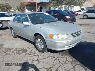 2001 Toyota Camry CE with VIN 4T1BG22K01U852935, listed as a IAAI auction lot 41705868 with 136,861 mi miles. Bid and sale history available at carsss.com. Image 1.