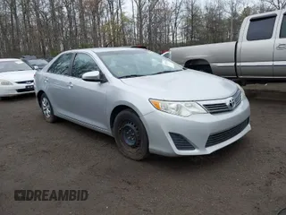 2012 Toyota Camry L with VIN 4T1BF1FK6CU572432, listed as a IAAI auction lot 41951610 with 242,977 mi miles. Bid and sale history available at carsss.com. Image 1.