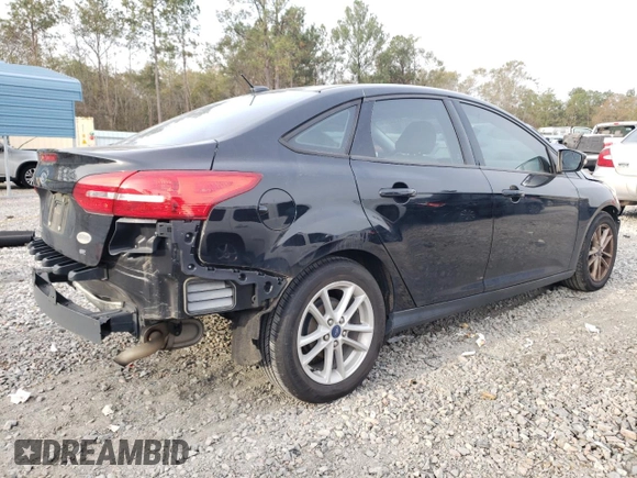 2017 Ford Focus SE with VIN 1FADP3F26HL221366, listed as a Copart auction lot 83308964 with 100,395 mi miles and Salvage Title. Bid and sale history available at carsss.com. Image 3.