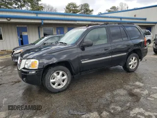 2006 GMC Envoy SLT with VIN 1GKDS13S762258032, listed as a Copart auction lot 88677095 with 184,188 mi miles and Salvage Title. Bid and sale history available at carsss.com. Image 1.