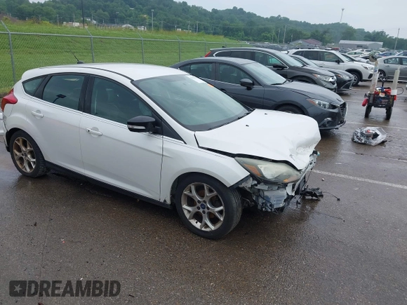 2014 Ford Focus Titanium with VIN 1FADP3N24EL184220, listed as a IAAI auction lot 42429610 with 172,575 mi miles and . Bid and sale history available at DreamBid. Image 1.