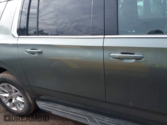 2023 Chevrolet Suburban Premier with VIN 1GNSCFKD3PR519575, listed as a IAAI auction lot 41467325 with 18,007 mi miles and . Bid and sale history available at DreamBid. Image 11.