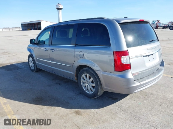 2013 Chrysler Town & Country Touring-L with VIN 2C4RC1CG6DR650928, listed as a IAAI auction lot 41740639 with 198,678 mi miles. Bid and sale history available at carsss.com. Image 3.