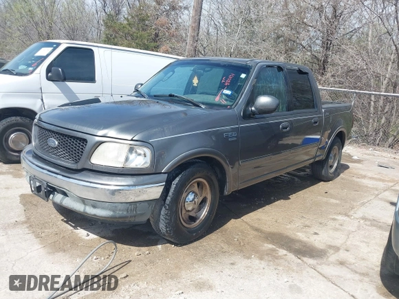 2003 Ford F-150 XLT with VIN 1FTRW076X3KA76379, listed as a IAAI auction lot 41821131 with 221,081 mi miles. Bid and sale history available at carsss.com. Image 2.