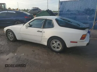 1987 Porsche 944 z VIN WP0AB0948HN473051, wystawiony jako Copart lot #73666654 z przebiegiem 82 580 mil mil oraz Szkoda całkowita • Salvage title. Historia ofert i sprzedaży dostępna na DreamBid. Obrazek 2.