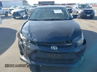 2015 Scion tC with VIN JTKJF5C71F3090963, listed as a IAAI auction lot 41802183 with 107,650 mi miles. Bid and sale history available at carsss.com. Image 12.