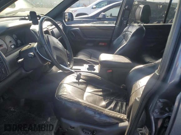 2001 Jeep Grand Cherokee Limited with VIN 1J4GW58N21C591520, listed as a Copart auction lot 42445475 with 247,858 mi miles and Salvage Title. Bid and sale history available at DreamBid. Image 7.