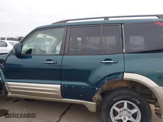 2002 Mitsubishi Montero LTD with VIN JA4MW51RX2J040586, listed as a IAAI auction lot 41566077 with 149,851 mi miles. Bid and sale history available at carsss.com. Image 14.