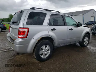 2010 Ford Escape XLS with VIN 1FMCU9C78AKD21851, listed as a Copart auction lot 61444945 with 70,404 mi miles and Clean title. Bid and sale history available at DreamBid. Image 3.