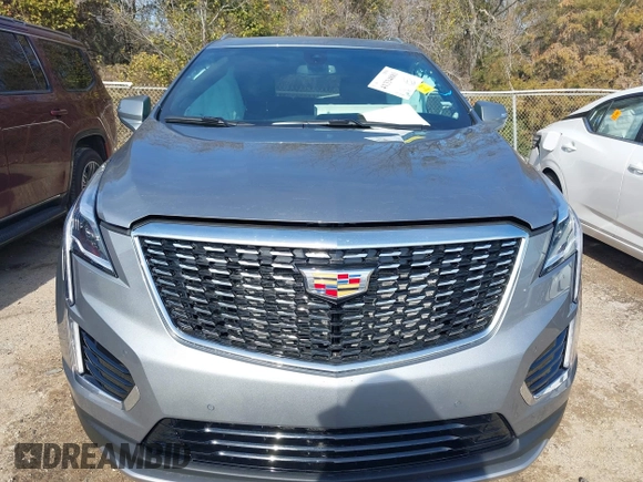 2025 Cadillac XT5 FWD Premium Luxury with VIN 1GYKNCRS1SZ120351, listed as a IAAI auction lot 41334881 with 4,915 mi miles. Bid and sale history available at carsss.com. Image 12.