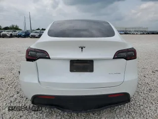 2020 Tesla Model Y Long Range z VIN 5YJYGDEE7LF010461, wystawiony jako Copart lot #55184315 z przebiegiem 88 285 mil mil oraz Szkoda całkowita • Salvage title. Historia ofert i sprzedaży dostępna na DreamBid. Obrazek 6.