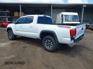 2018 Toyota Tacoma SR5 with VIN 3TMDZ5BN5JM048038, listed as a IAAI auction lot 42084922 with 79,718 mi miles and . Bid and sale history available at DreamBid. Image 3.