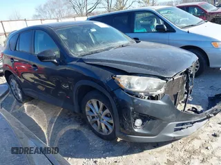 2013 Mazda CX-5 Grand Touring with VIN JM3KE2DE1D0164723, listed as a IAAI auction lot 41364590 with 227,932 mi miles. Bid and sale history available at carsss.com. Image 1.