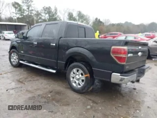 2011 Ford F-150 XLT with VIN 1FTFW1CT5BFB13799, listed as a IAAI auction lot 41426609 with 200,000 mi miles. Bid and sale history available at carsss.com. Image 3.