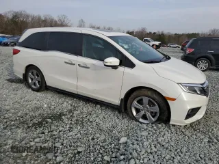 2019 Honda Odyssey EX-L with VIN 5FNRL6H72KB014960, listed as a Copart auction lot 48701035 with 131,921 mi miles and Salvage Title. Bid and sale history available at carsss.com. Image 4.