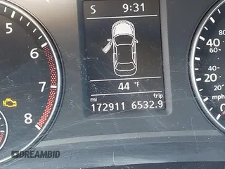 2013 Volkswagen Passat SEL Premium z VIN 1VWCP7A33DC071818, wystawiony jako IAAI lot #41905651 z przebiegiem 172 911 mil mil oraz . Historia ofert i sprzedaży dostępna na DreamBid. Obrazek 7.