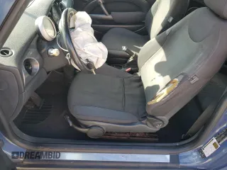 2005 MINI Convertible with VIN WMWRF33555TF62593, listed as a Copart auction lot 48305985 with 172,839 mi miles and Salvage title. Bid and sale history available at DreamBid. Image 7.