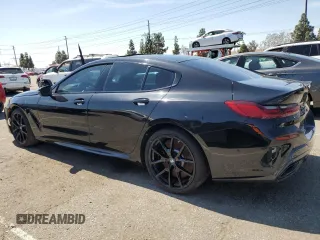 2022 BMW 8 Series M850i with VIN WBAGV8C02NCK08667, listed as a Copart auction lot 50335155 with 22,737 mi miles and Salvage title. Bid and sale history available at DreamBid. Image 2.